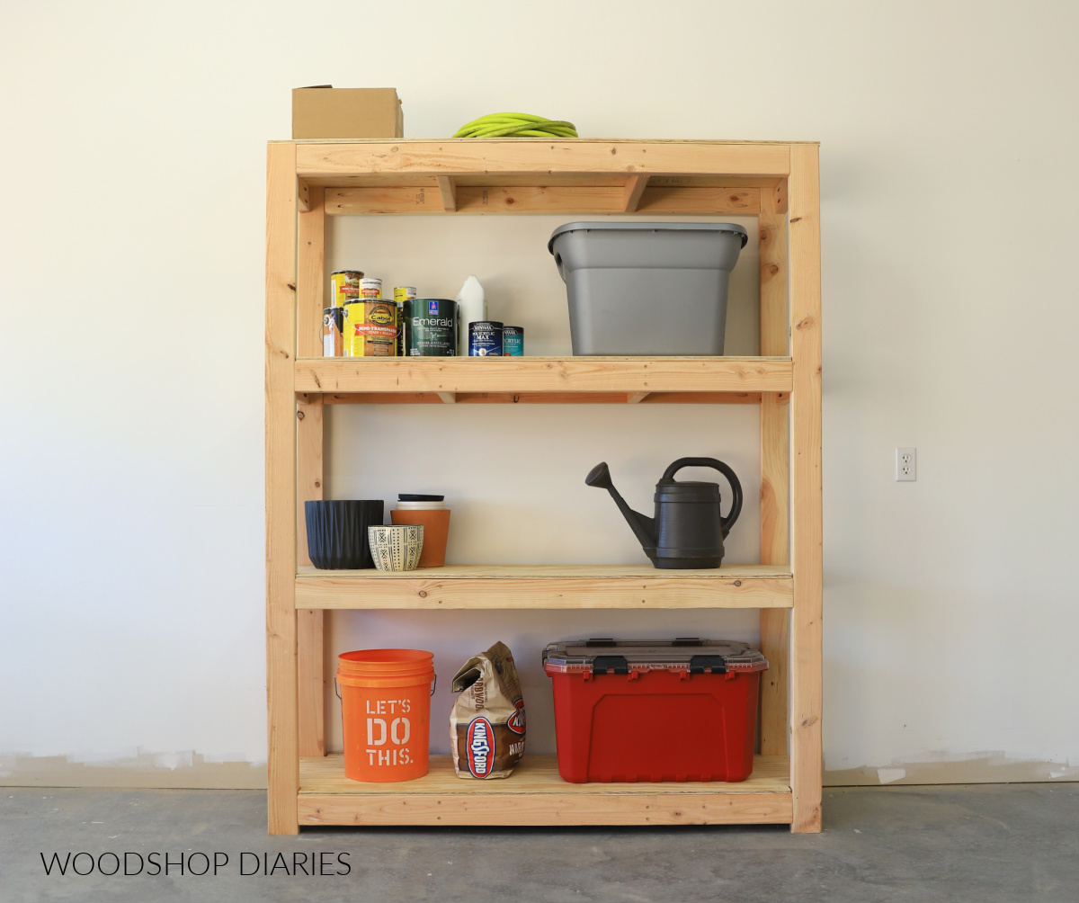 Finished DIY Heavy Duty Garage shelf unit with 4 tiers made with 2x4s and plywood