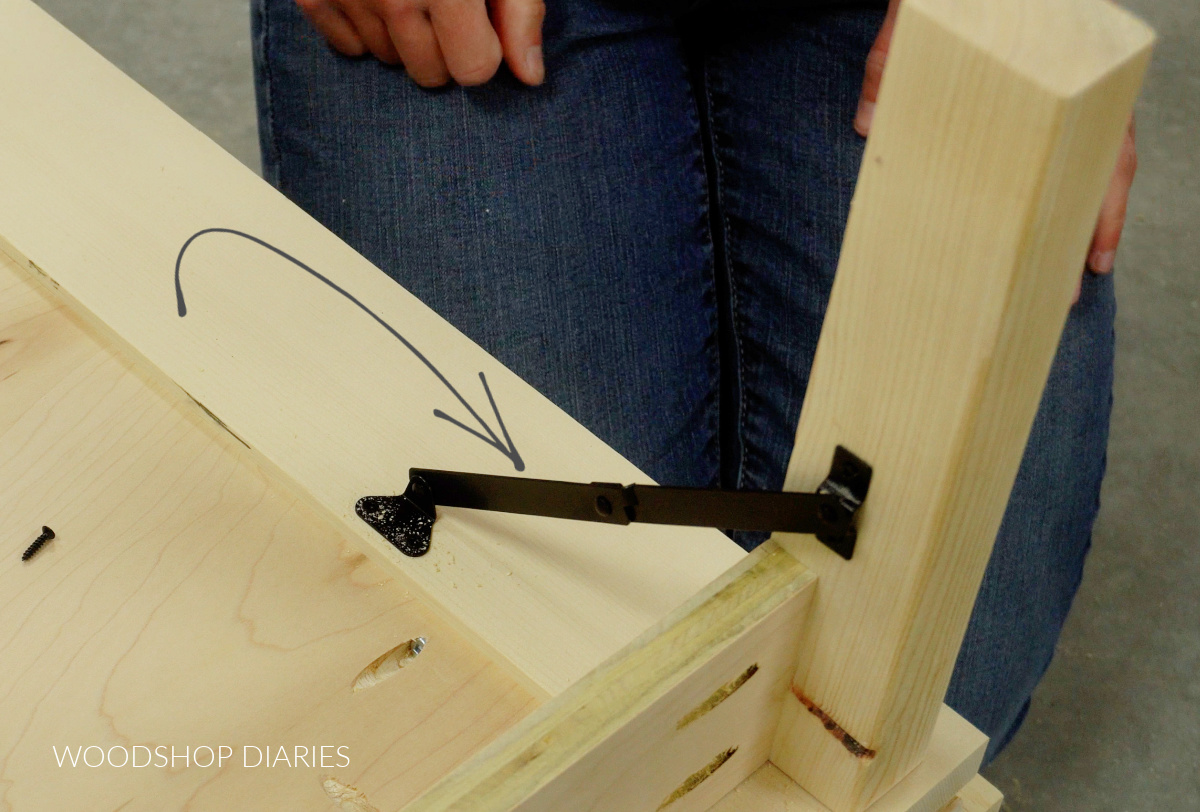 Close up of lid support installed onto murphy bed cabinet legs