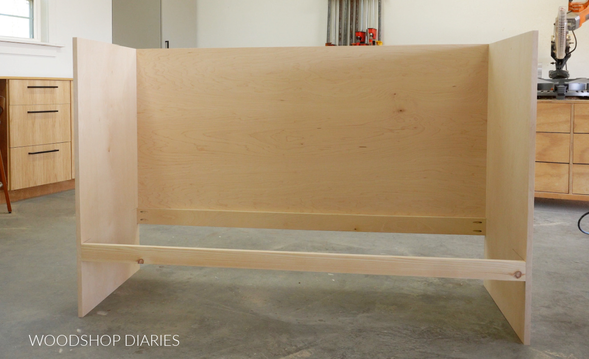 Murphy bed cabinet body assembled with sides, back, and front and back supports