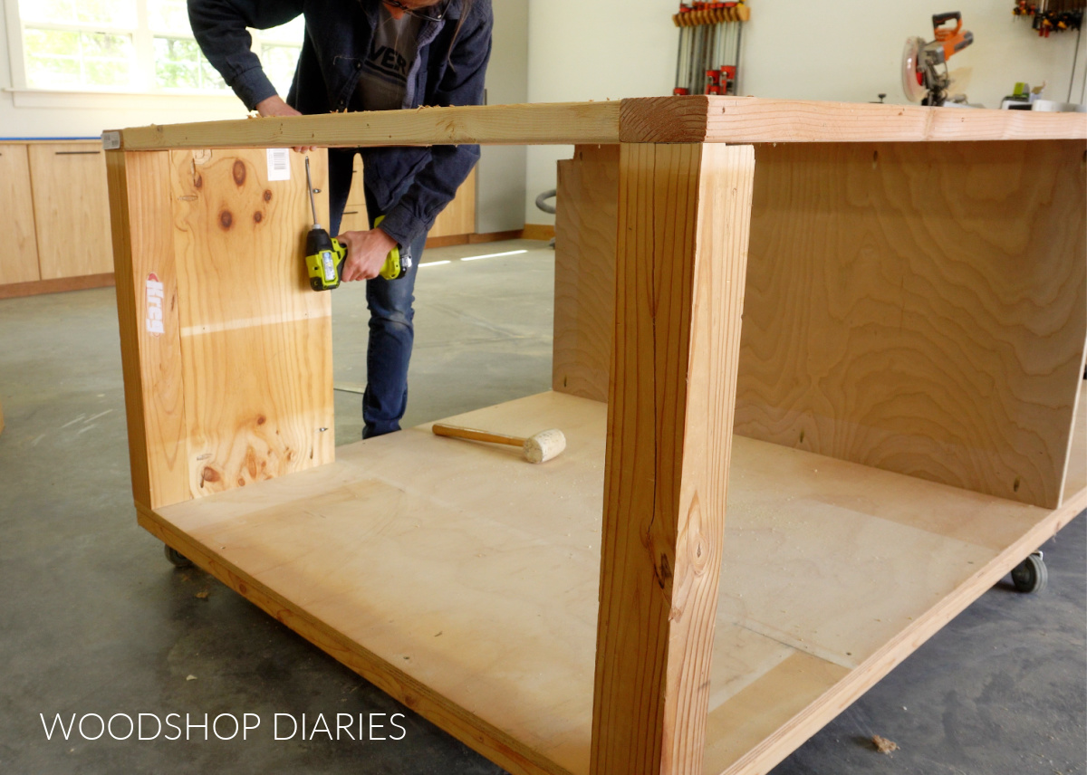 Shara Woodshop Diaries securing side panels of mobile workbench with pocket hole screws