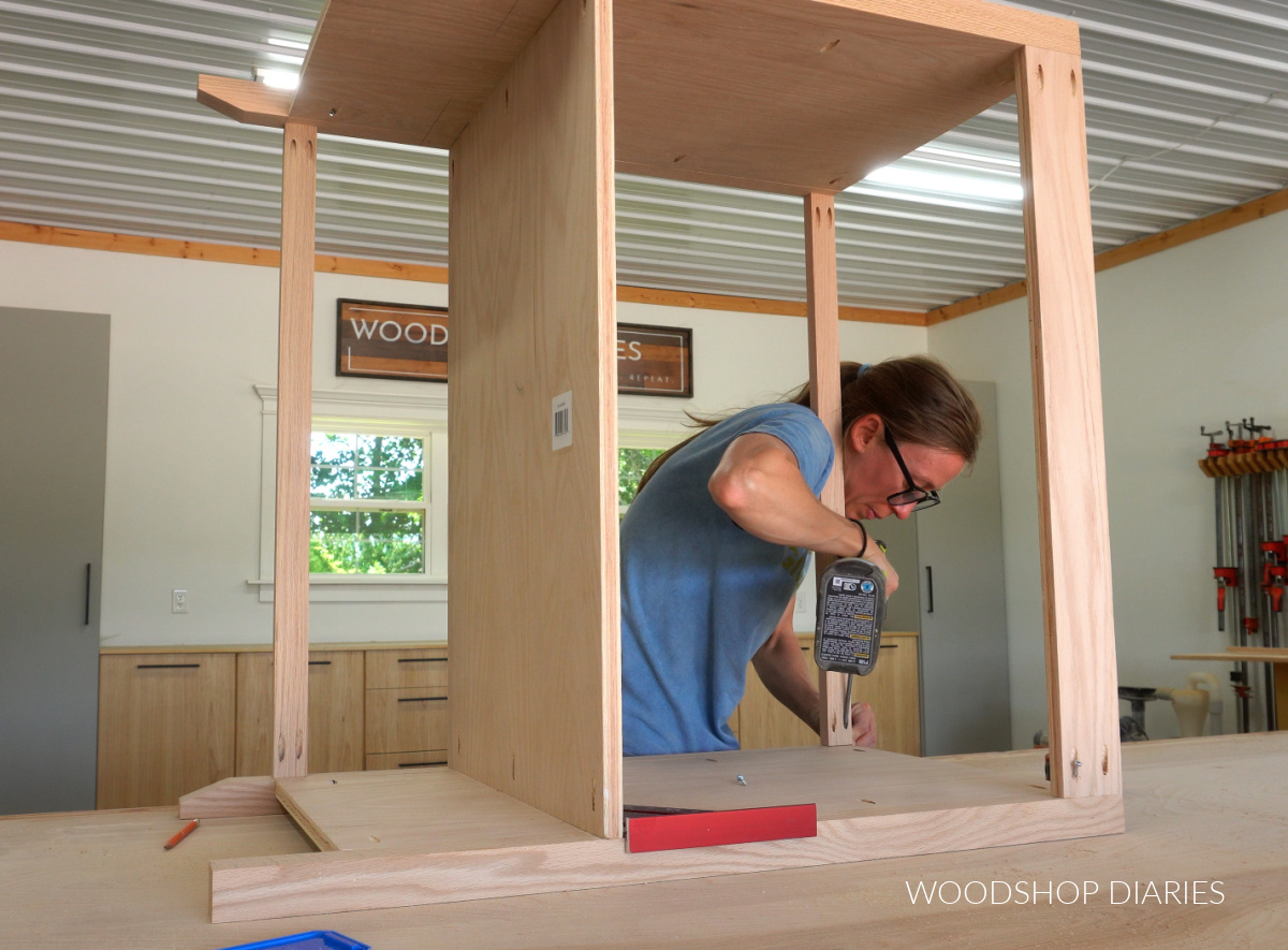 Shara Woodshop Diaries assembling DIY small fluted bathroom vanity frame using pocket holes and screws on workbench