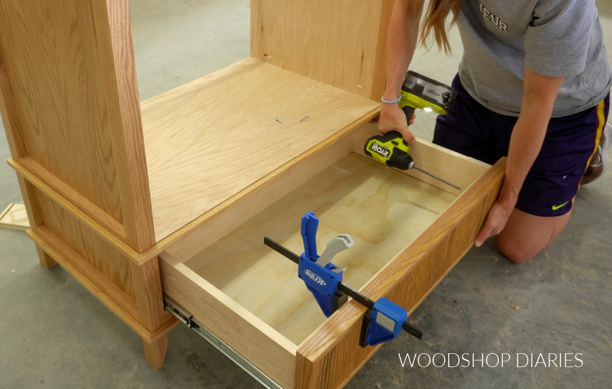 Shara Woodshop Diaries securing drawer front onto drawer box of small DIY bathroom vanity