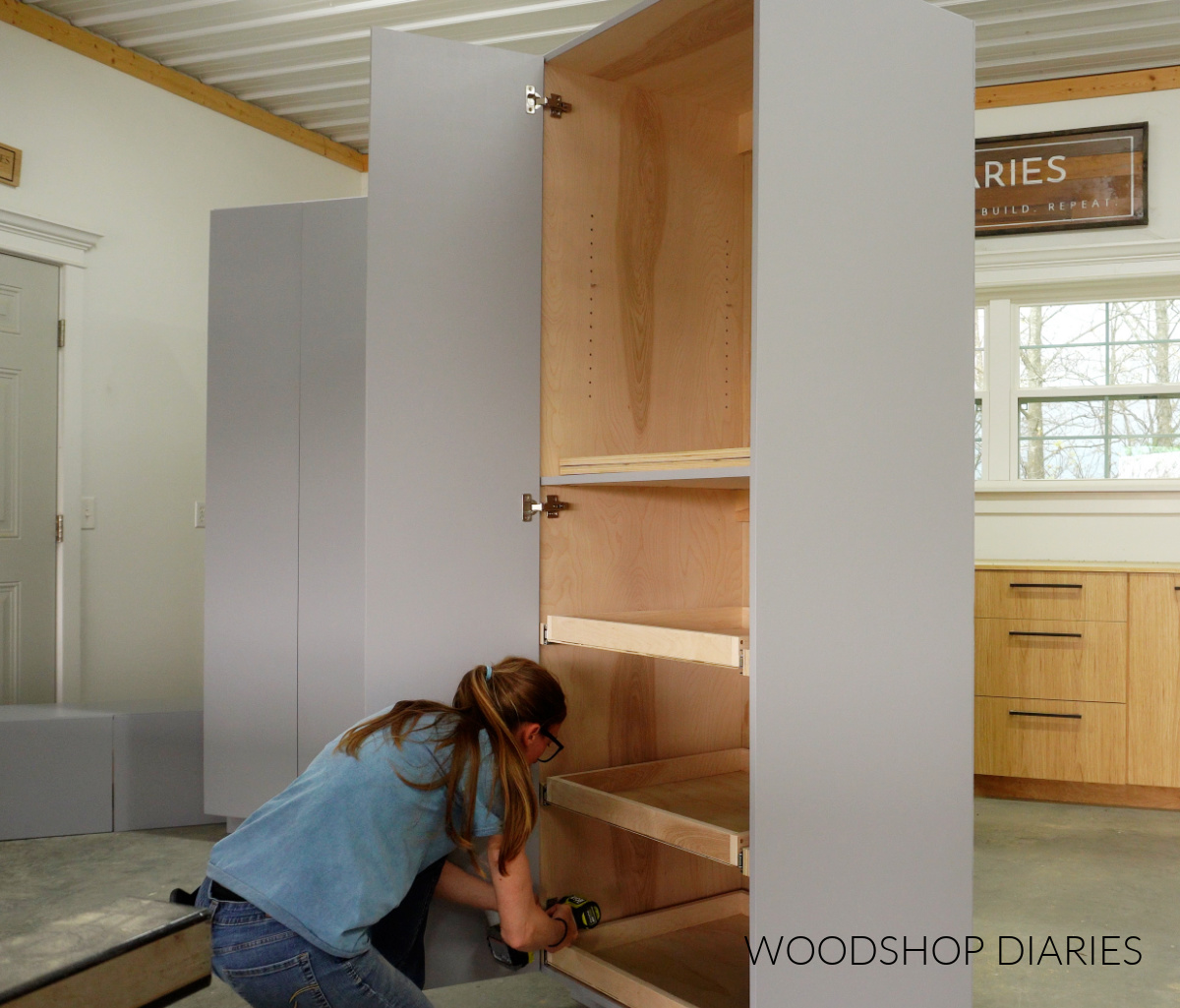 Shara Woodshop Diaries installing large cabinet doors on tall garage cabinets