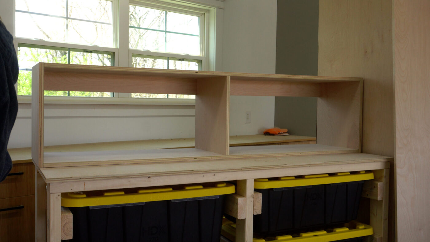Large upper cabinet box assembled and setting on workbench top