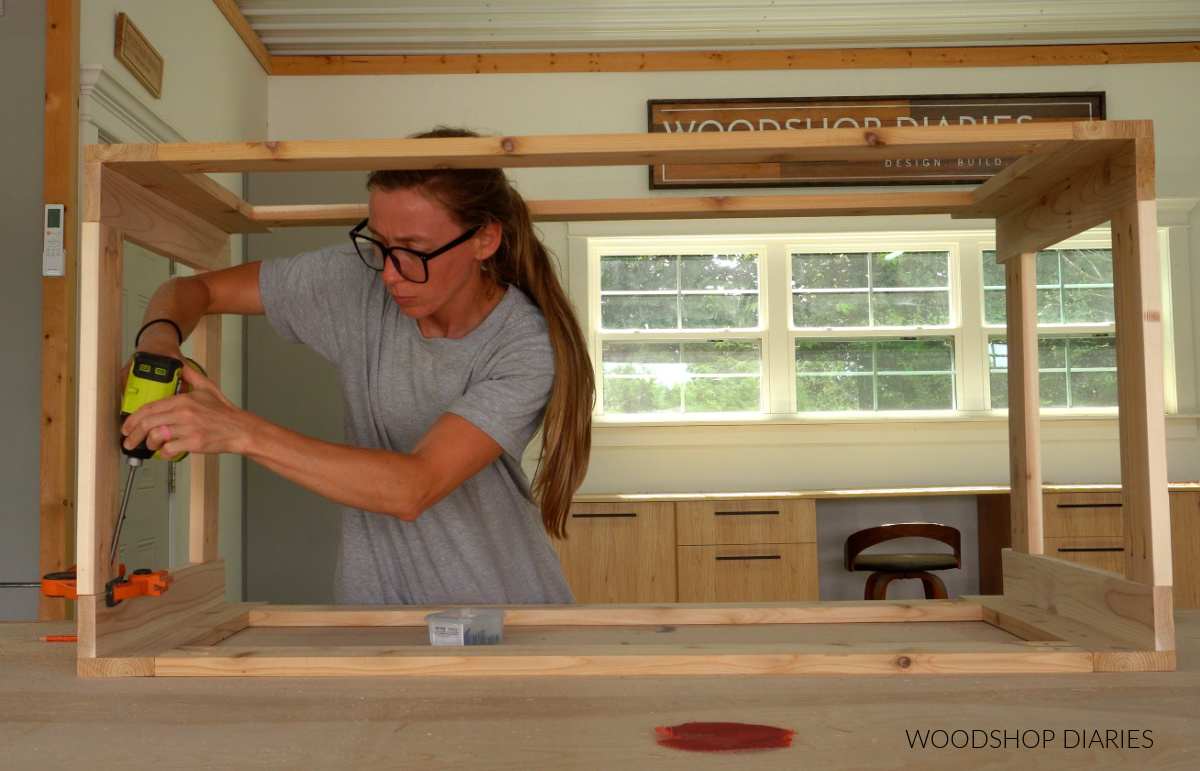 Shara Woodshop Diaries assembling outdoor storage box frame in workshop