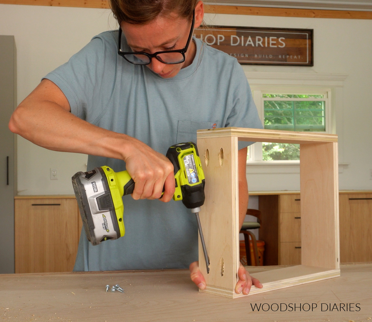 Shara Woodshop Diaries assembling small drawer boxes on workbench using pocket hole screws