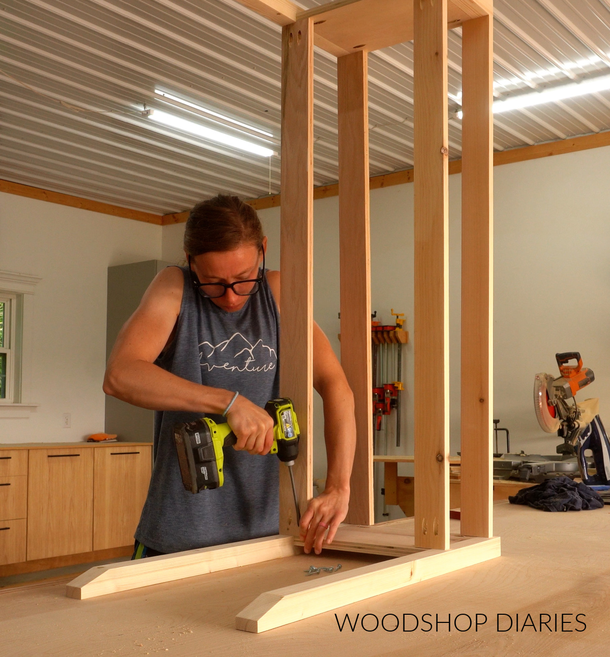 Shara Woodshop Diaries installing the top supports of console table frame on workbench