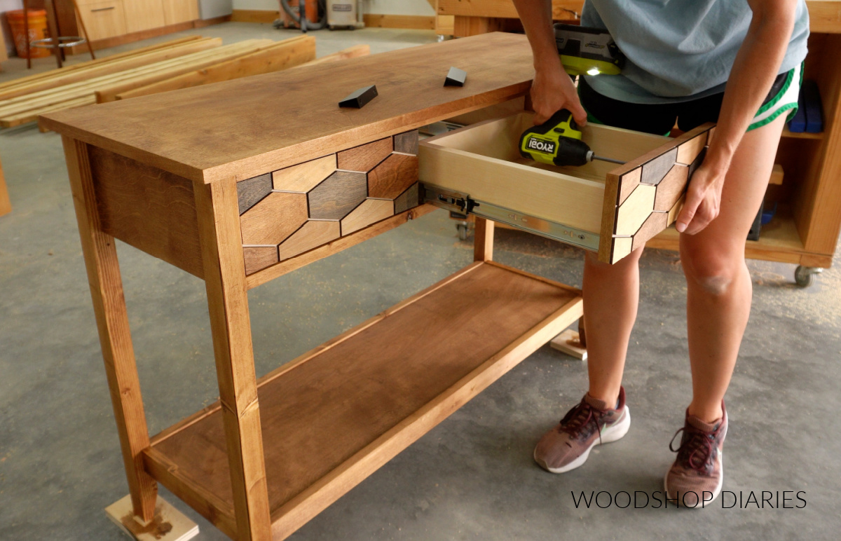 Shara Woodshop Diaries installing drawer fronts onto drawer boxes of console table