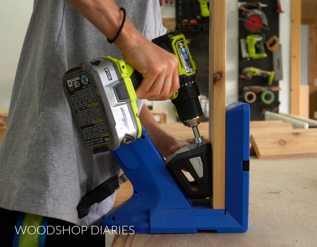 Shara Woodshop Diaries drilling pocket holes into ends of cedar board