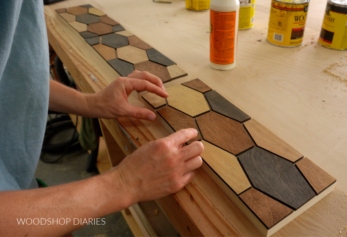 Shara Woodshop Diaries gluing drawer front overlay design onto drawer fronts after stain