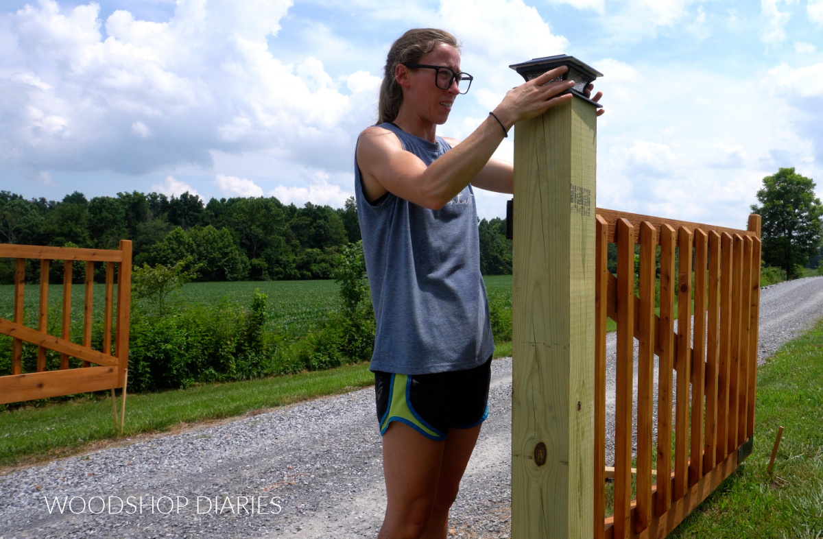 Shara Woodshop Diaries installing solar light post caps on gate posts