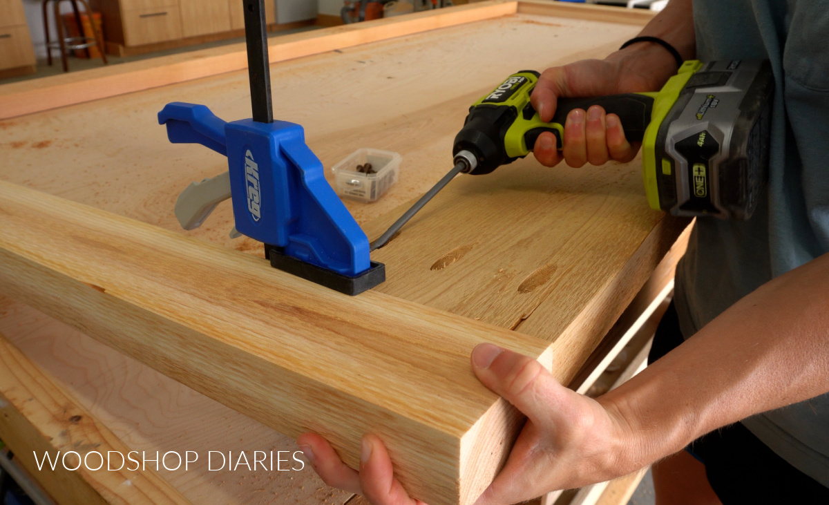 Shara Woodshop Diaries driving pocket holes in gate frame