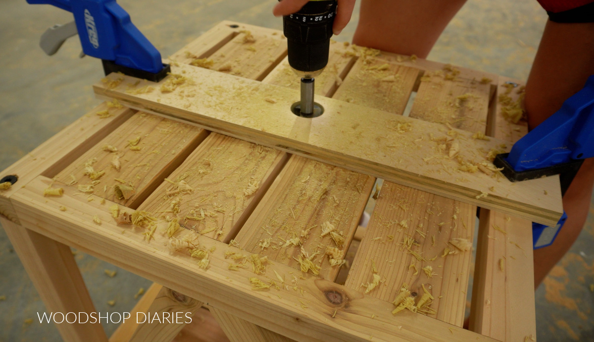 Drilling hole for umbrella pole in top of wooden table