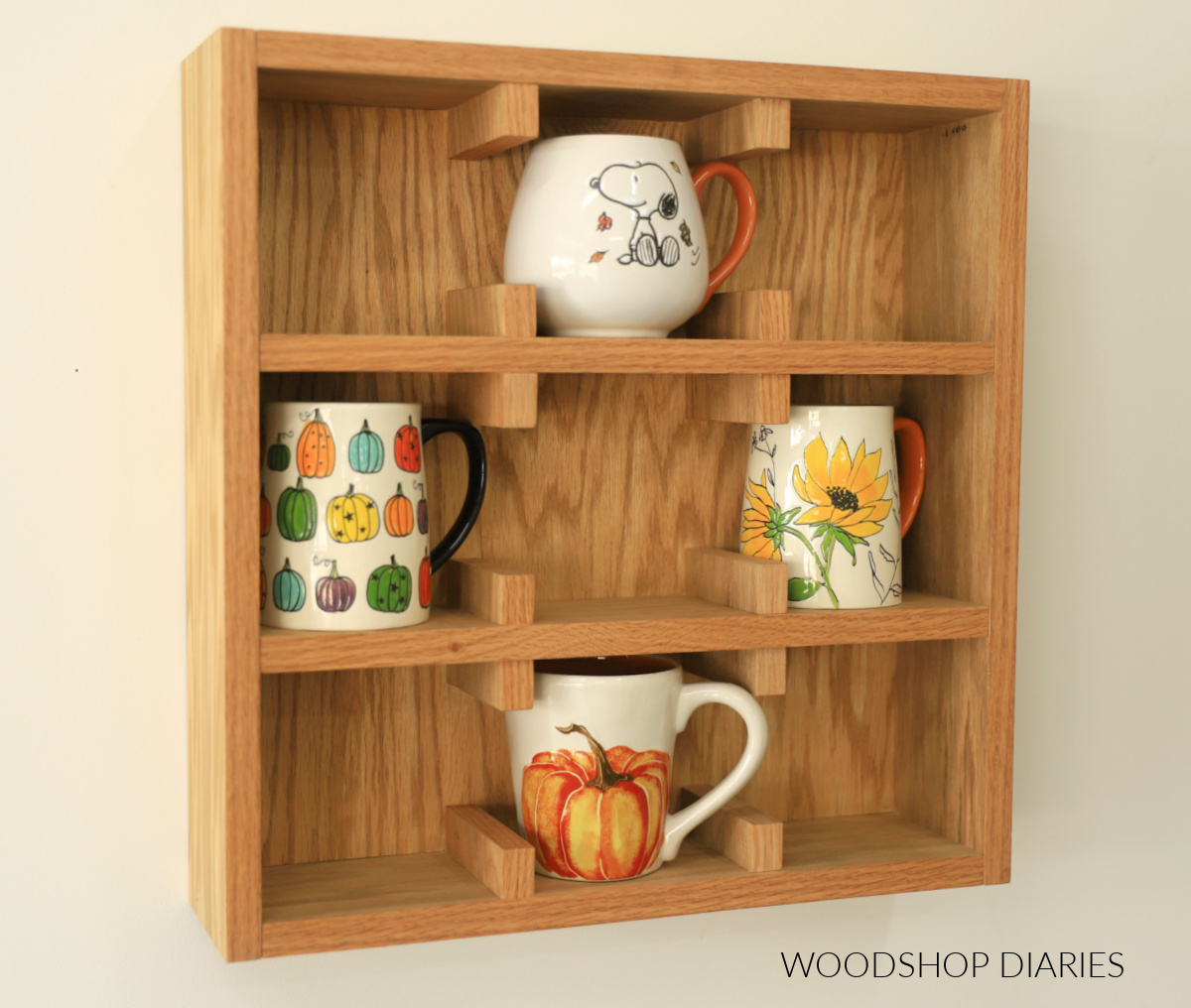 red oak plywood DIY mug shelf wall mounted with four mugs in cubbies