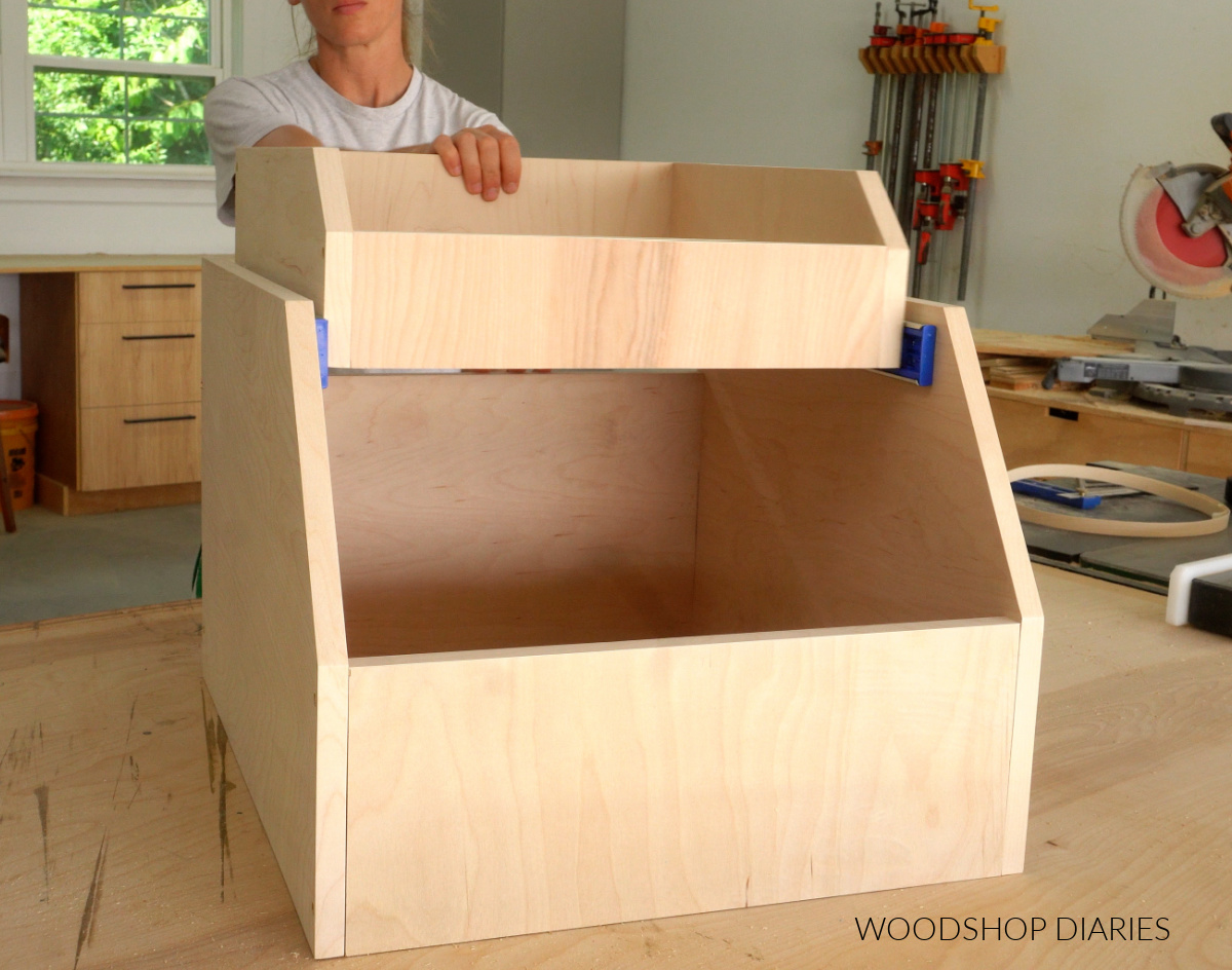 Shara Woodshop Diaries installing upper drawer into larger drawer of cabinet organizer for tupperware storage