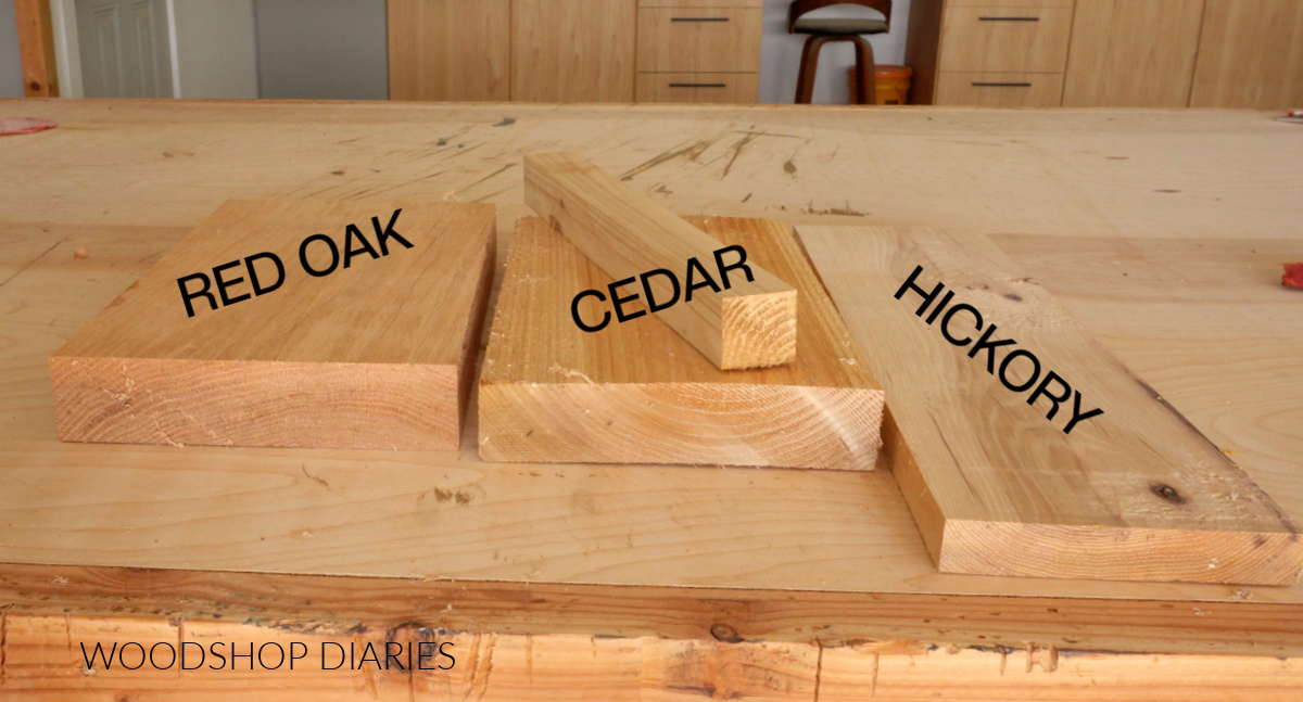 Red oak, cedar, and hickory scrap wood laying on workbench