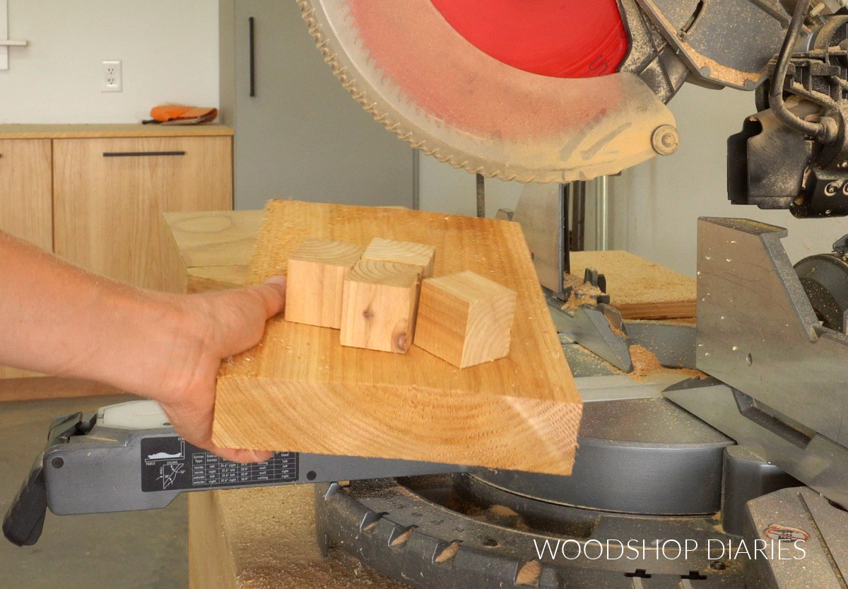 2x8 cedar block with four cubes on top to make riser