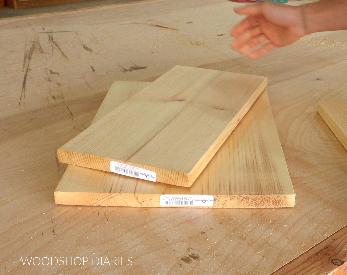 Scrap pine boards laying on workbench