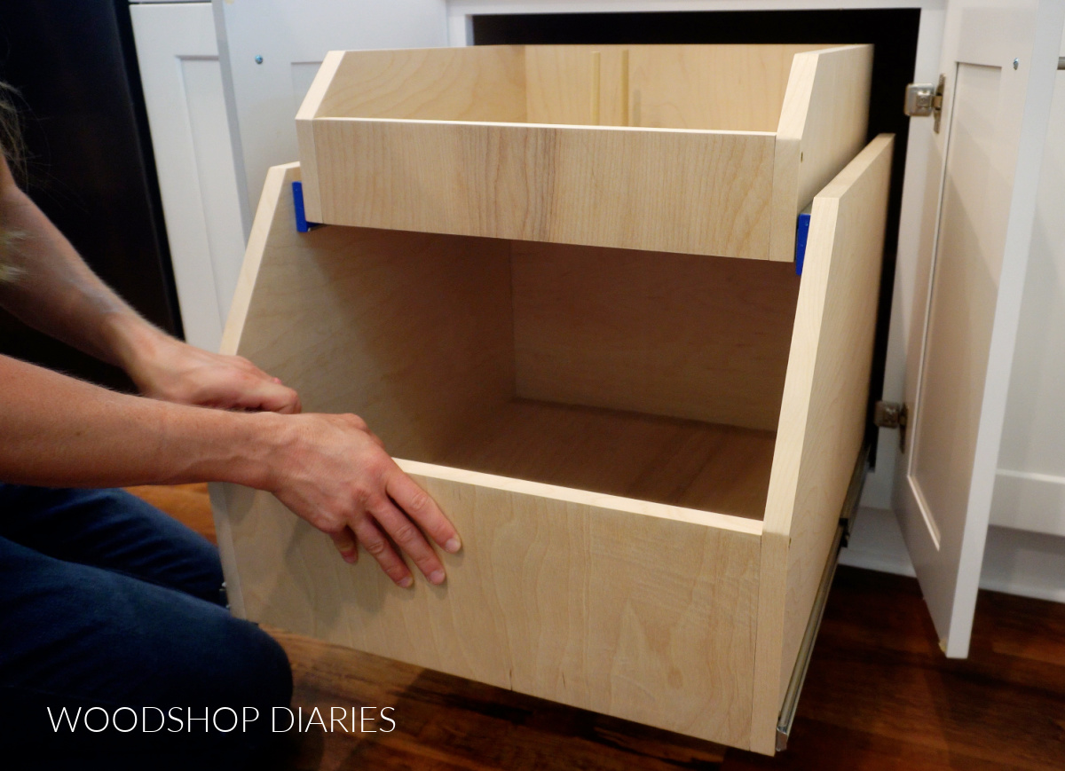 Shara Woodshop Diaries sliding cabinet organizer drawer into base cabinet onto drawer slides