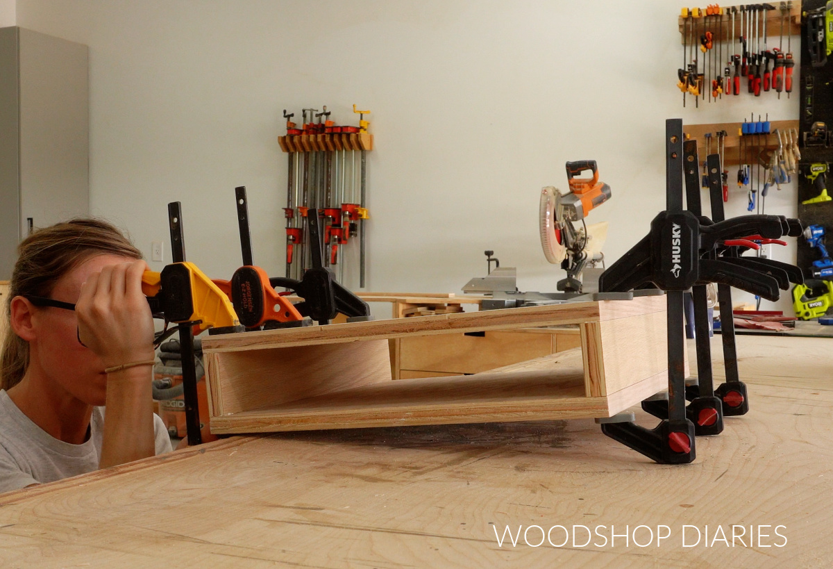 Shara Woodshop Diaries clamping sides to make hollow plywood box for DIY chunky bench legs