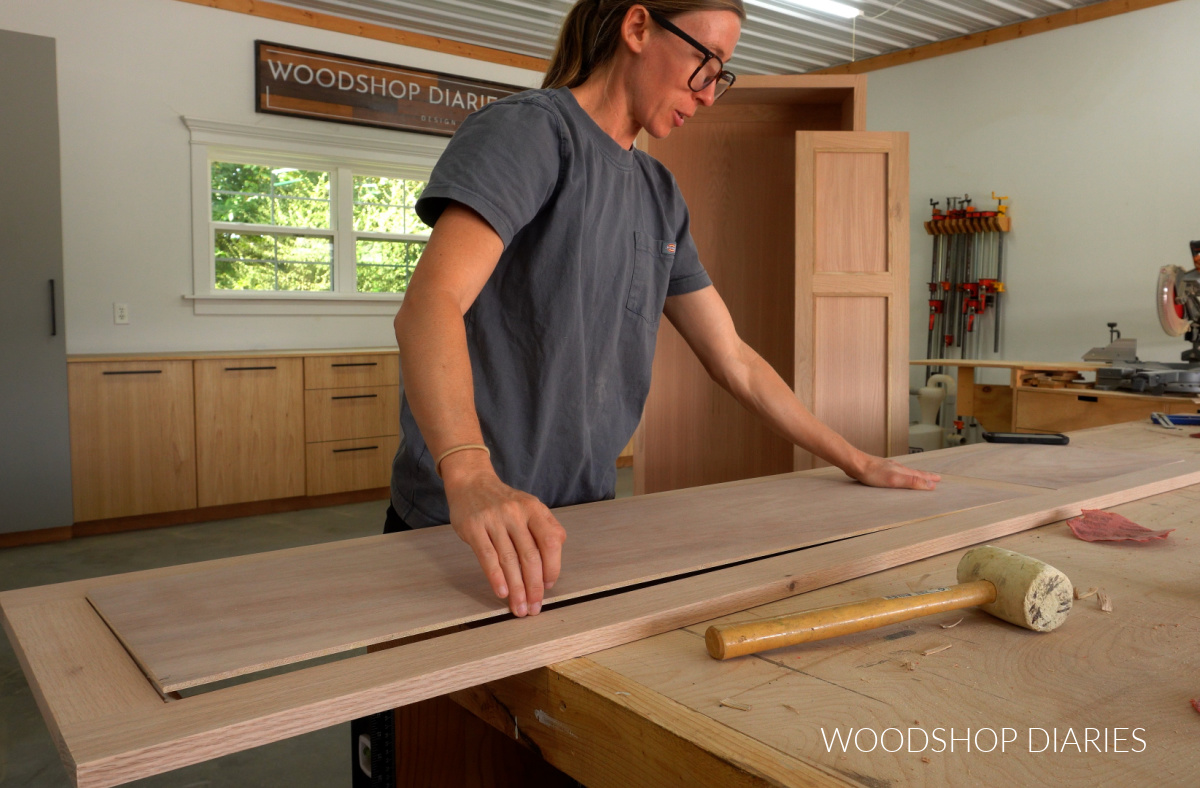 Shara Woodshop Diaries placing ¼" plywood door panels into door frame