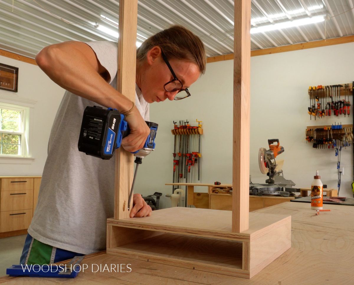 Shara Woodshop Diaries securing seat supports for bench seat on workbench