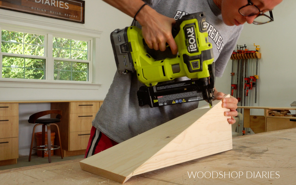 Shara Woodshop Diaries nailing twisty table legs together on workbench