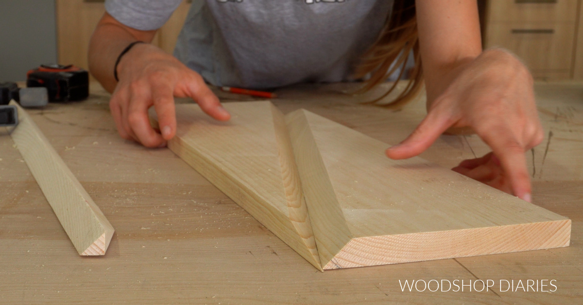 Twisty table leg pieces cut and placed on workbench to show V notch down diagonal
