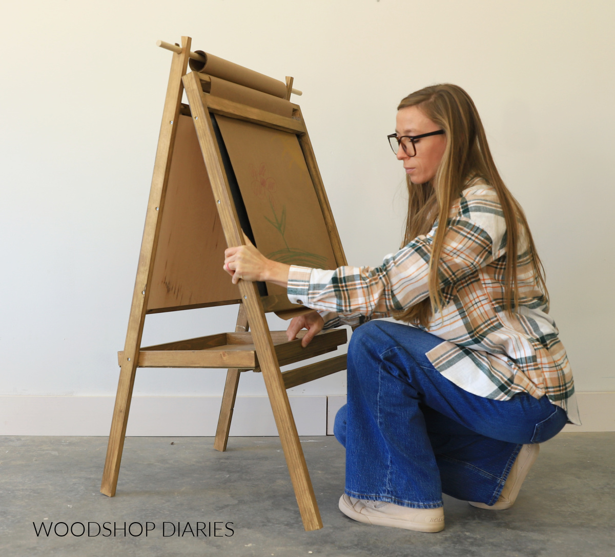 Shara Woodshop Diaries opening fold up easel to position tray