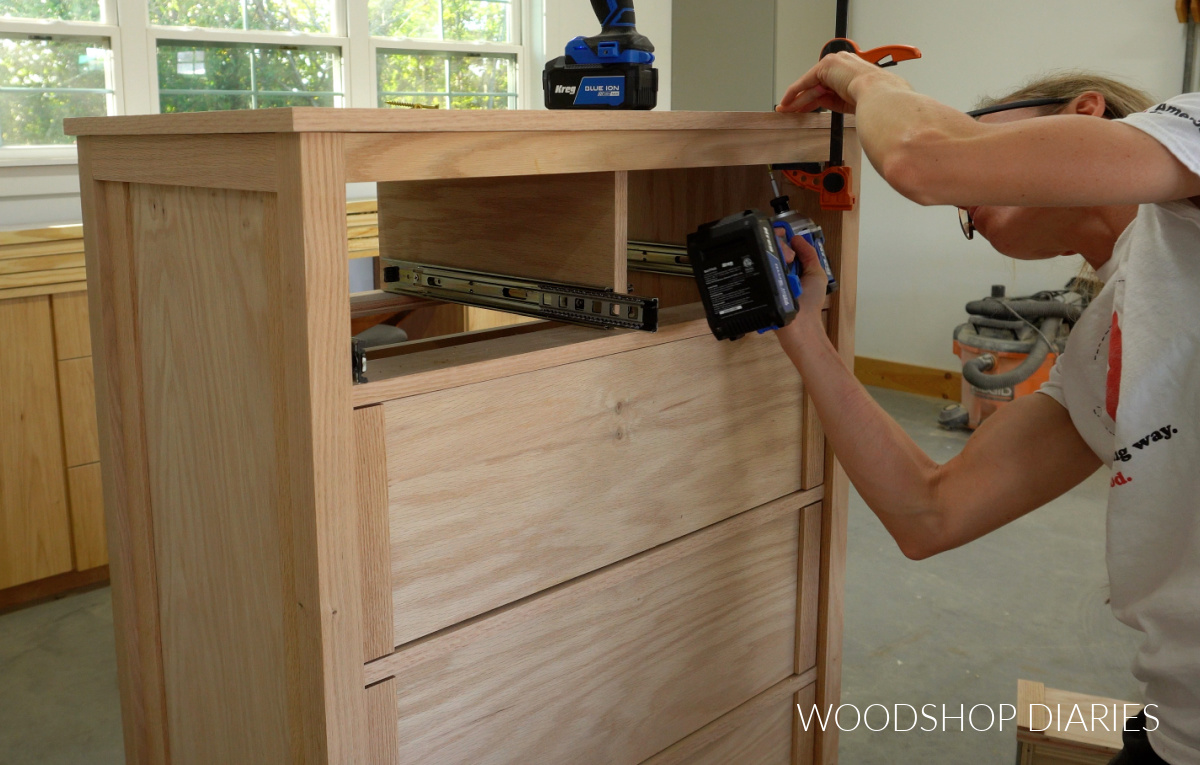 Shara Woodshop Diaries screwing top panel of dresser onto frame