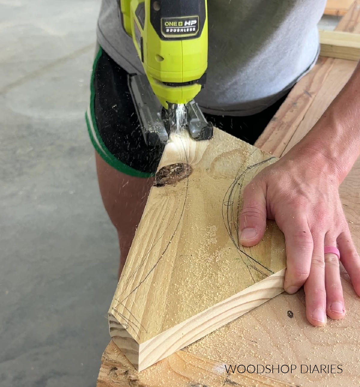 Close up of cutting sign support for wooden lamp post with jig saw