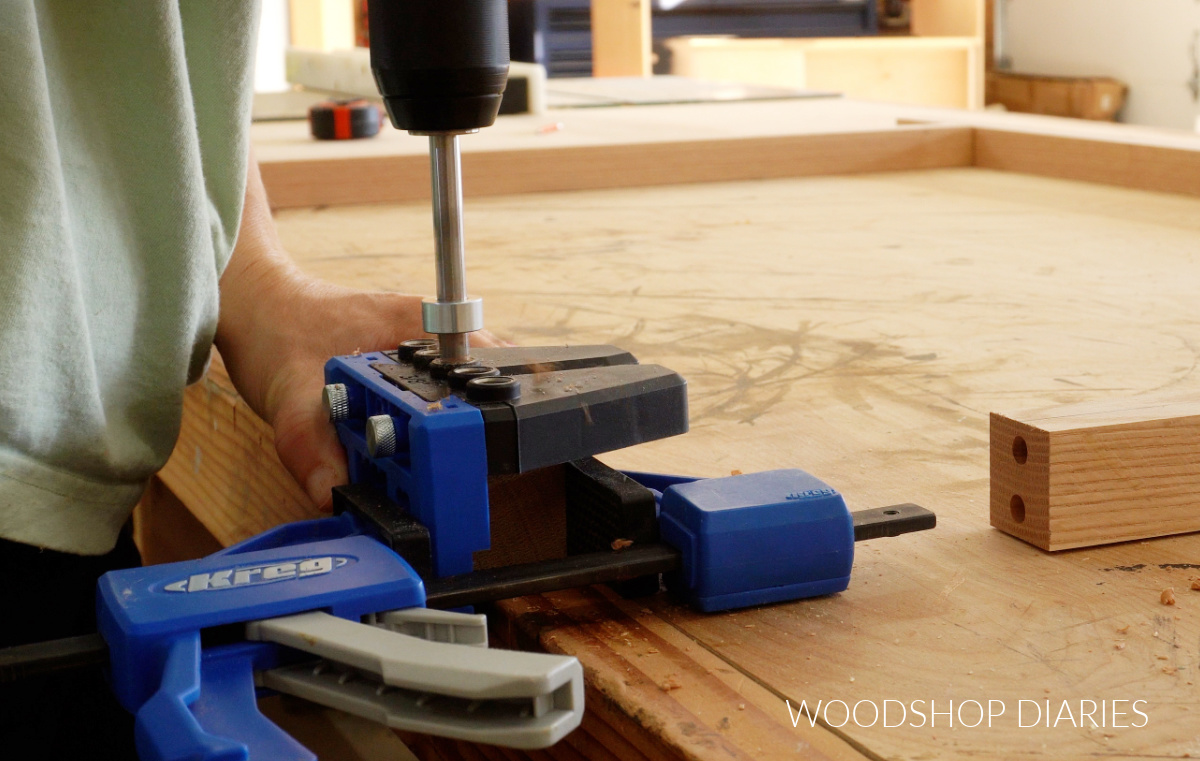 Close up of drilling dowel holes with Kreg dowel jig
