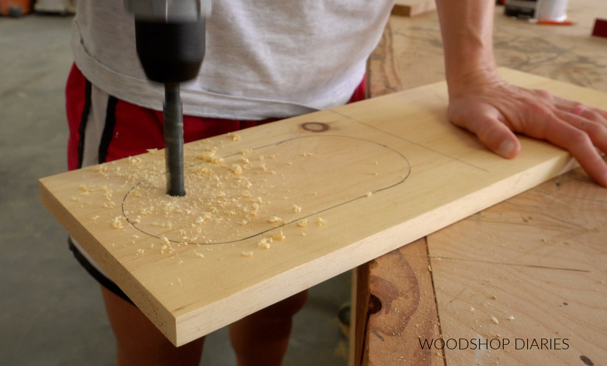 Drilling large hole in scrap board to cut oval 