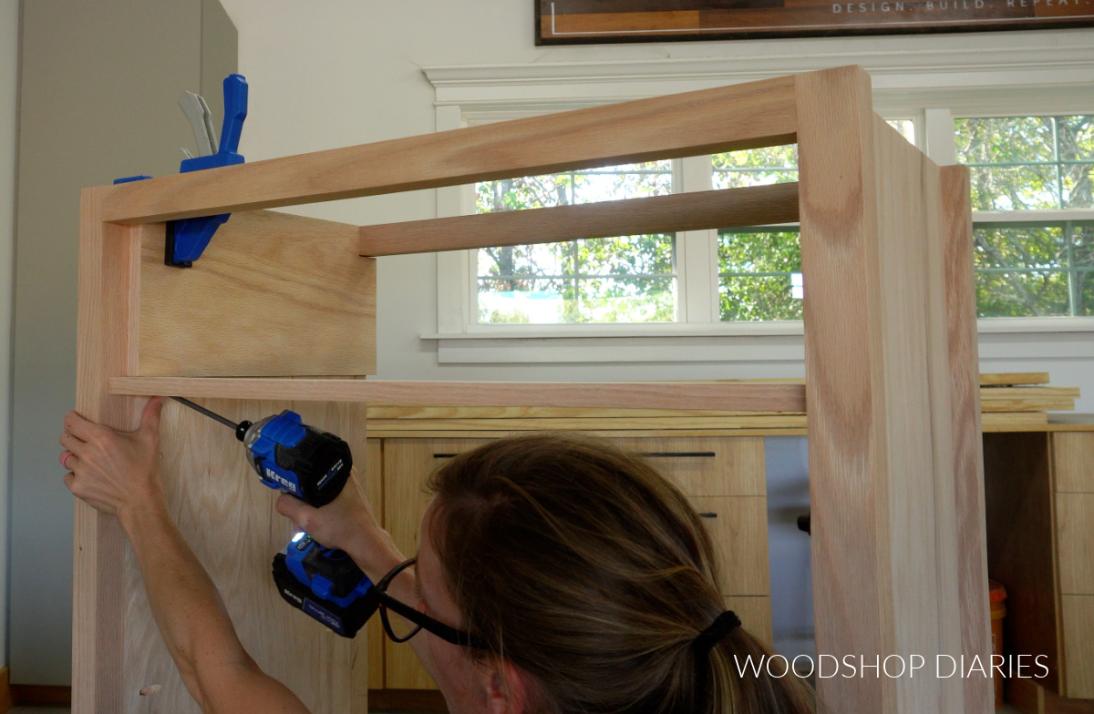 Shara Woodshop Diaries installing top drawer divider strips into tall dresser frame