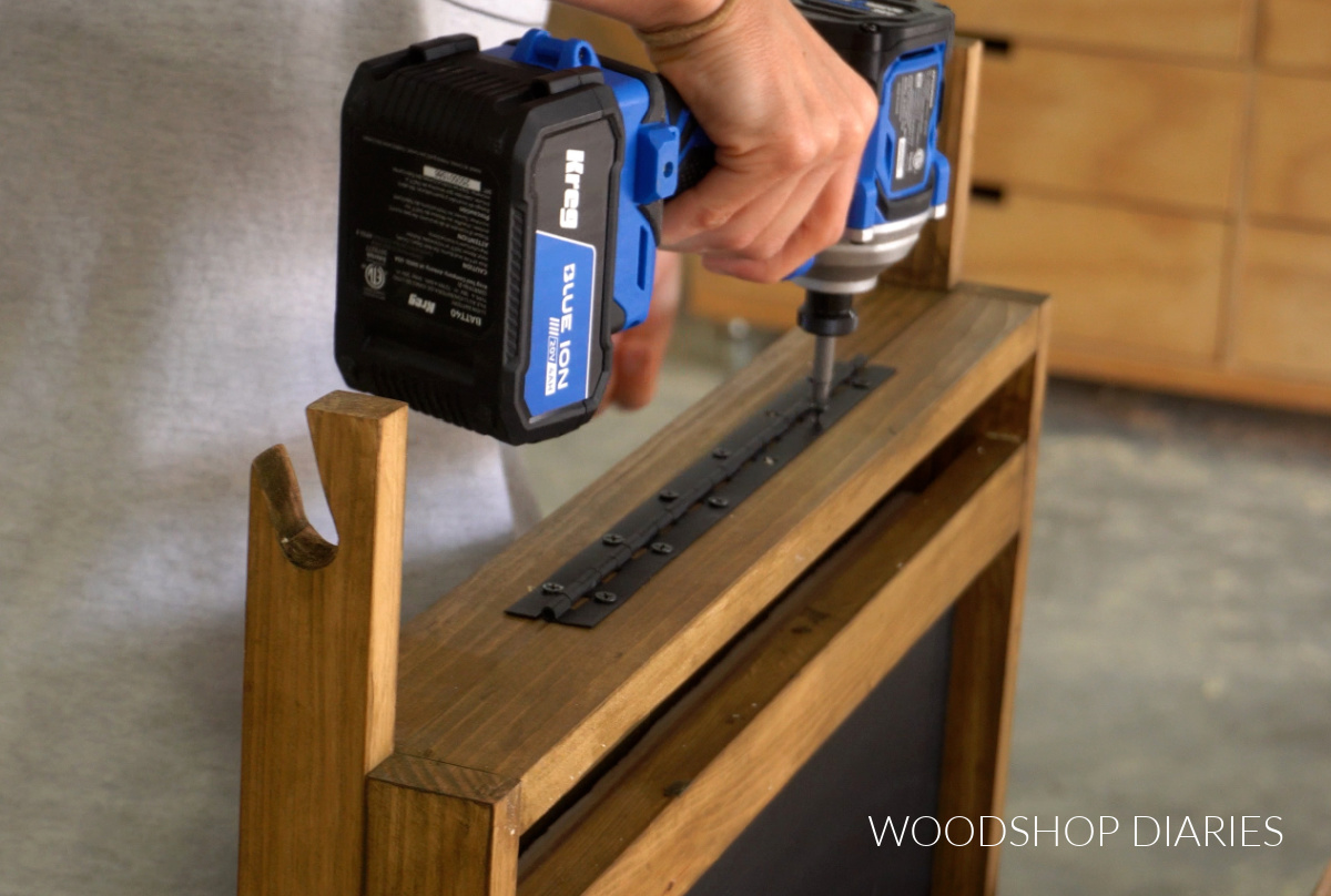 Attaching two sides of easel with piano hinge