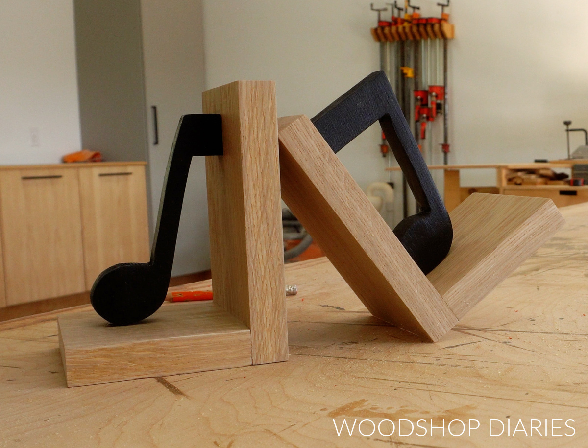 DIY wooden bookends with music note symbols on workbench