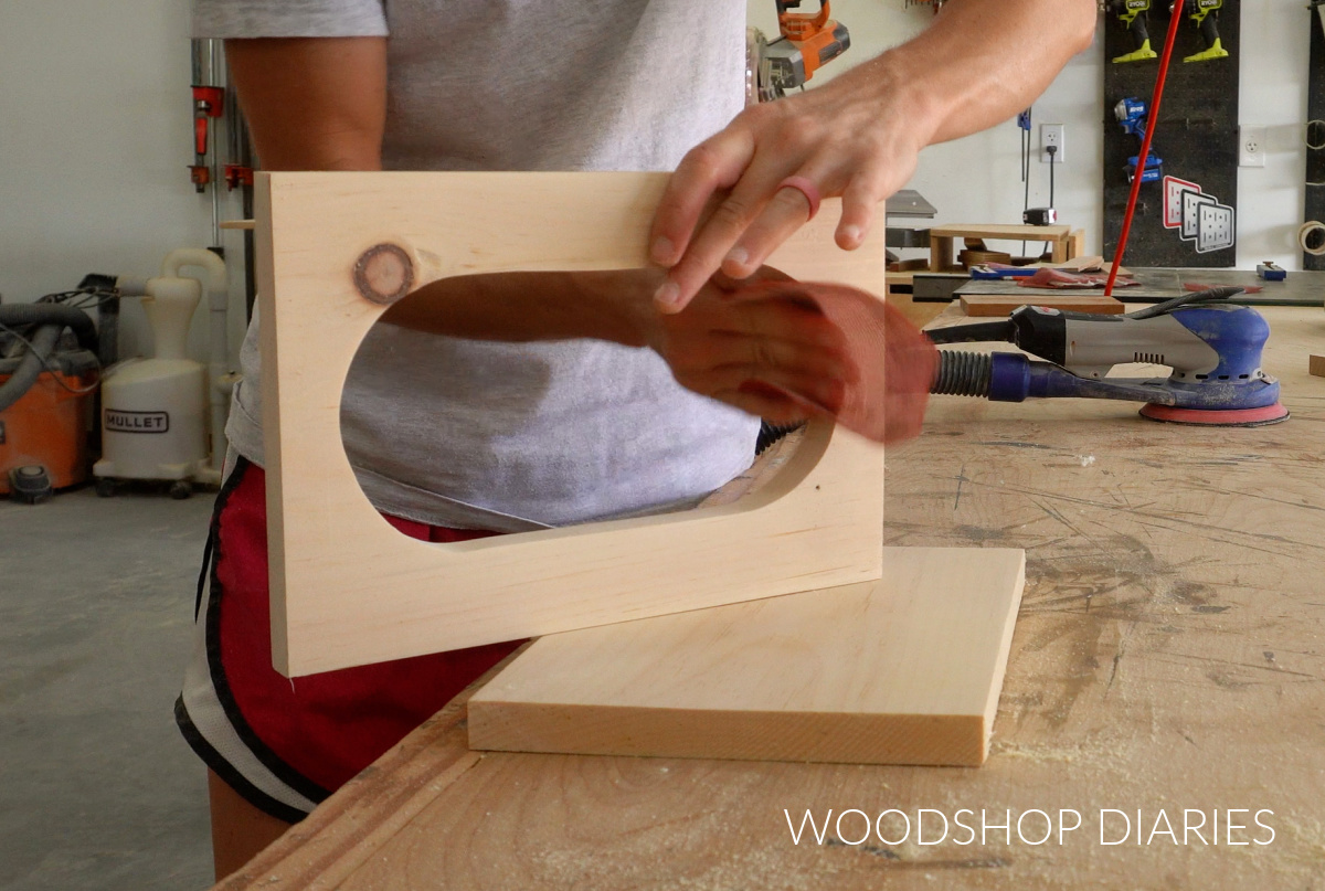 Two pieces of pine 1x8 cut and being sanded to make tray
