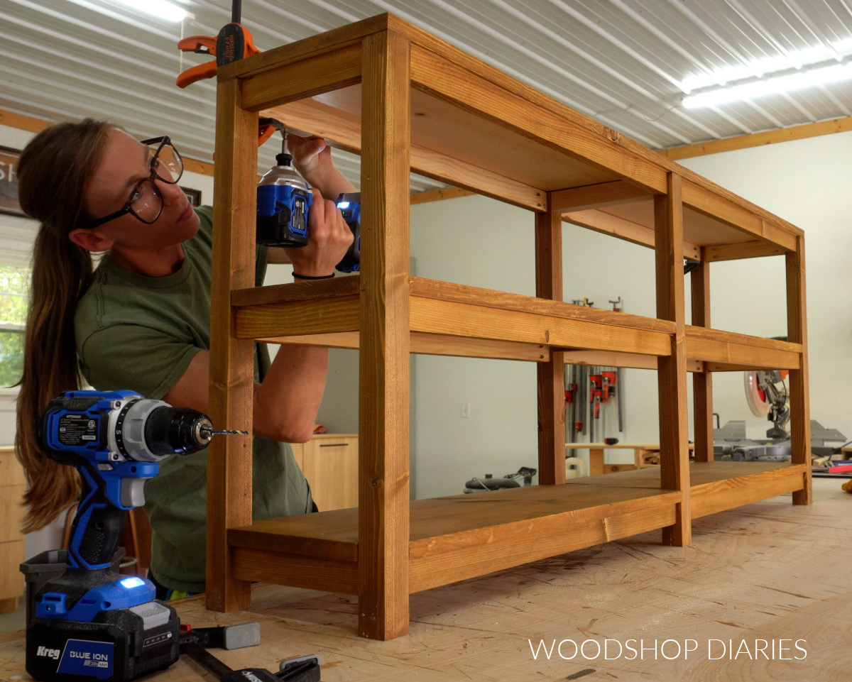 Shara Woodshop Diaries securing shelves to console table frame using screws through bottom supports