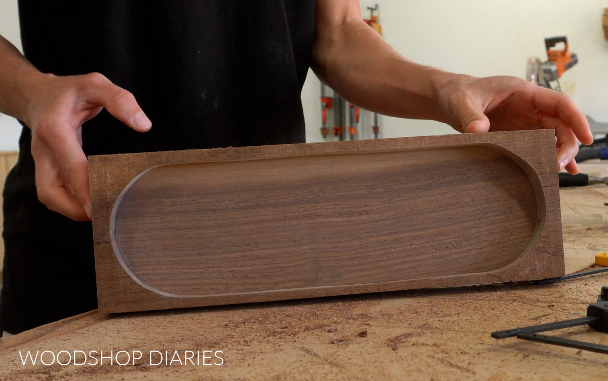 Close up of walnut board glued together for DIY catch all tray
