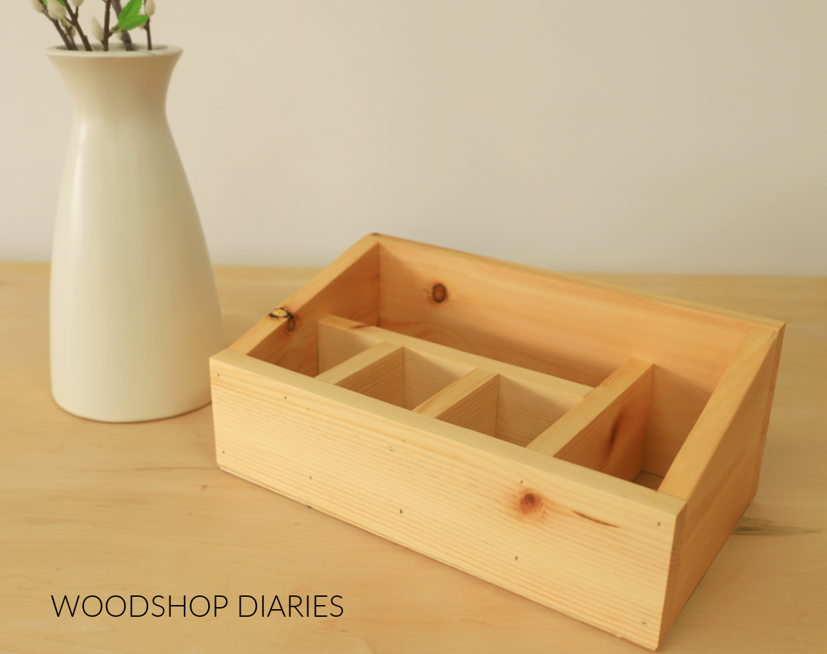 Completed DIY wooden utensil holder caddy empty on tabletop