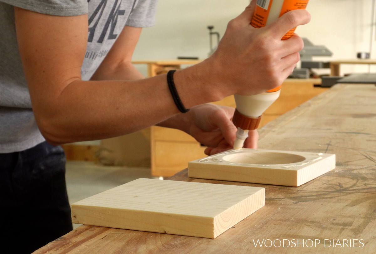 Shara Woodshop Diaries applying wood glue to attach party cup holder together