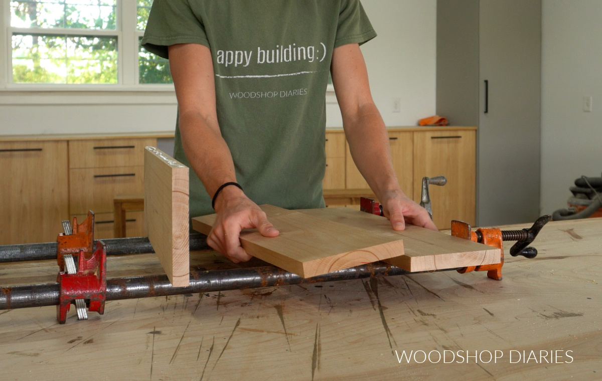 Shara Woodshop Diaries gluing up wooden panel to make cake stand with