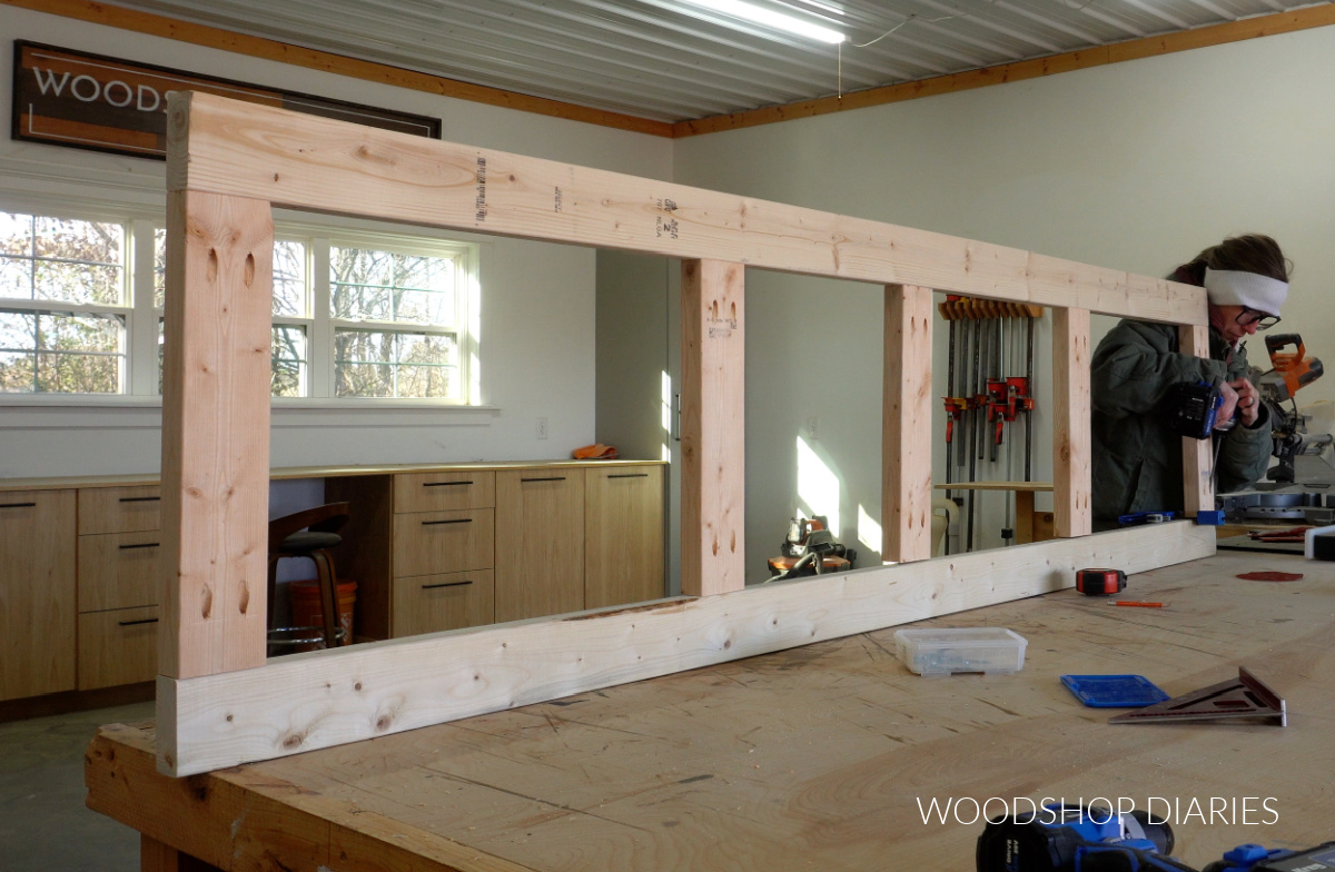 Shara Woodshop Diaries assembling 2x4 miter saw stand base frame using pocket holes and screws on workbench