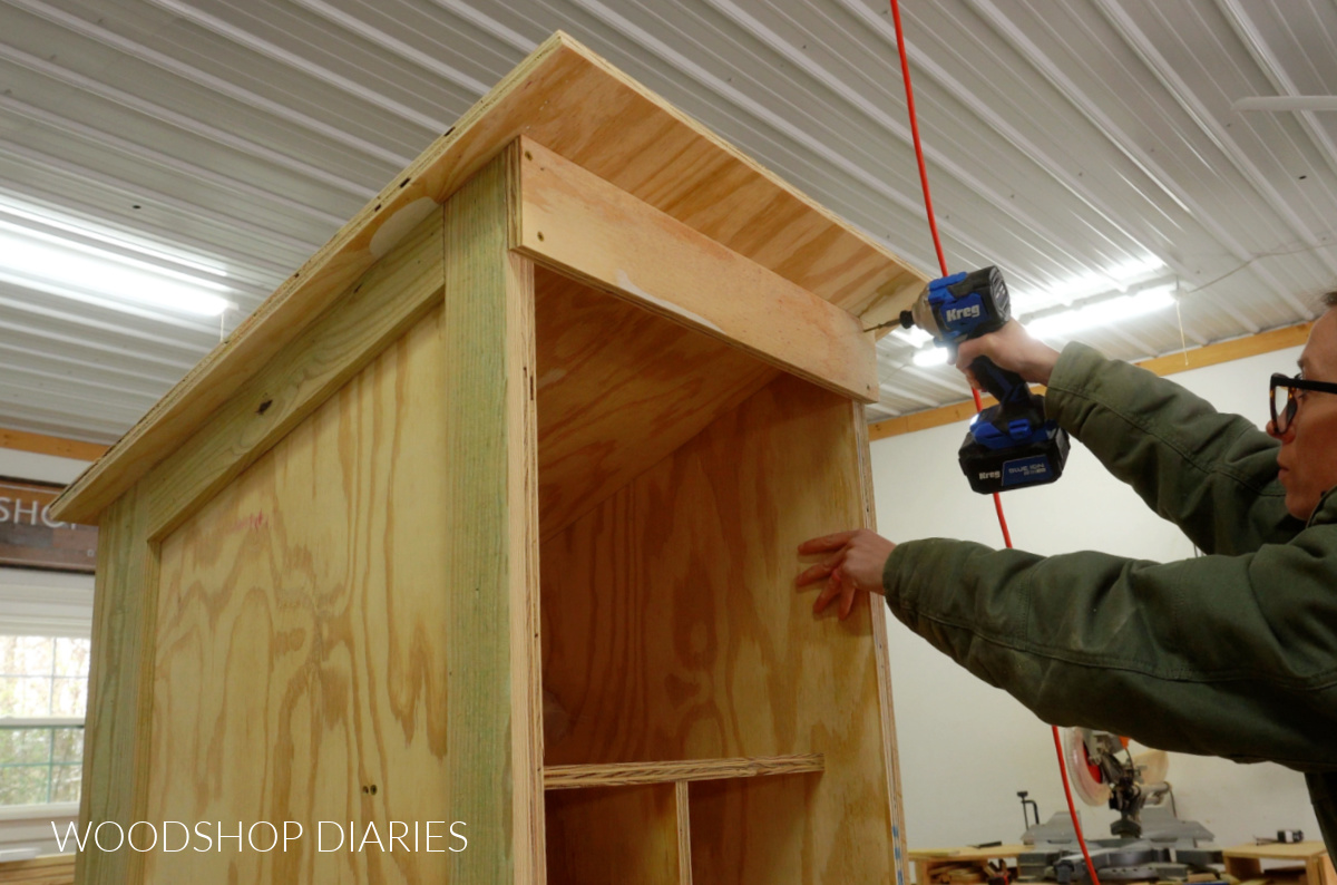 Shara Woodshop Diaries securing top front trim piece to blessing box with screws
