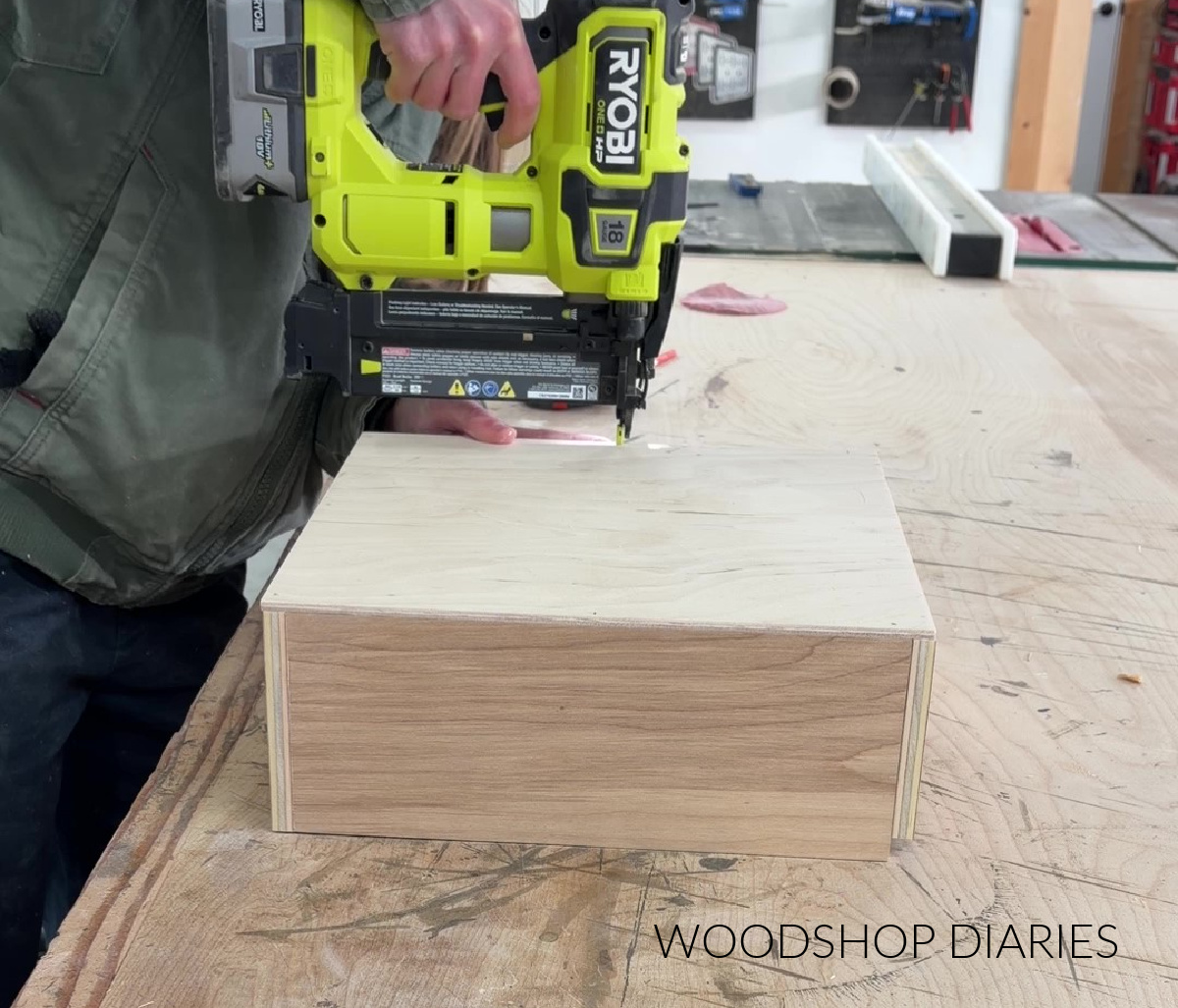Shara Woodshop Diaries brad nailing ¼" plywood bottom panel onto pie box