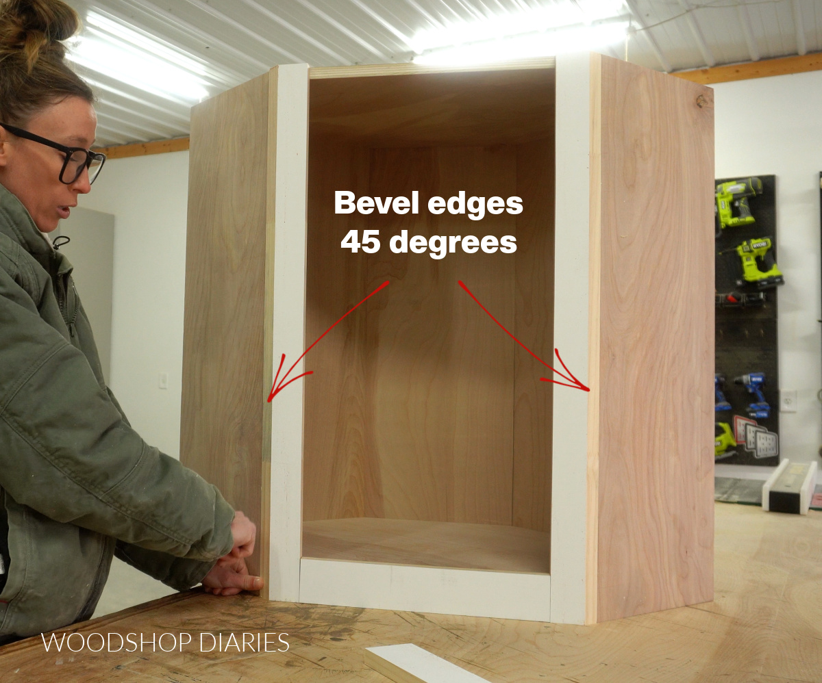 Shara Woodshop Diaries test fitting beveled face frame pieces onto front of corner cabinet box