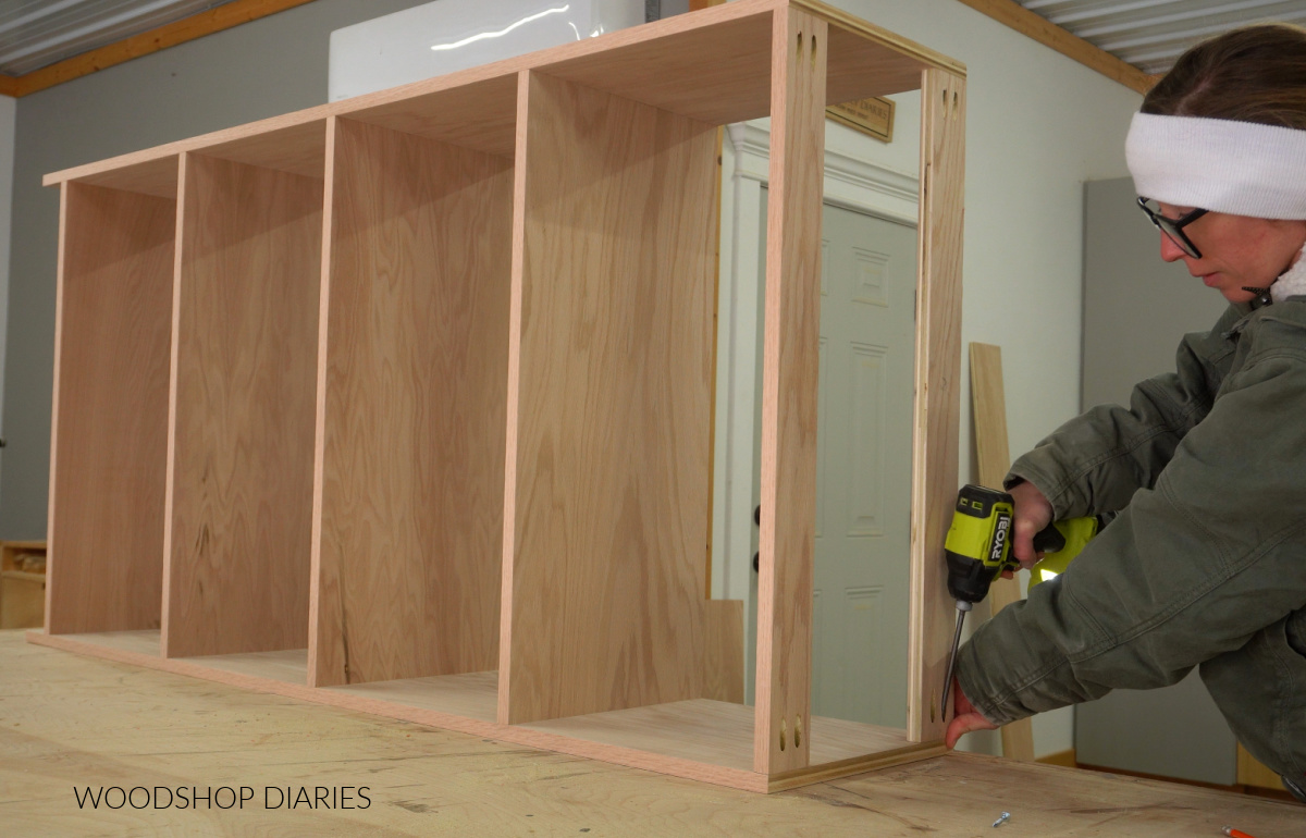 Shara Woodshop Diaries assembling plywood bookcase using pocket holes on workbench
