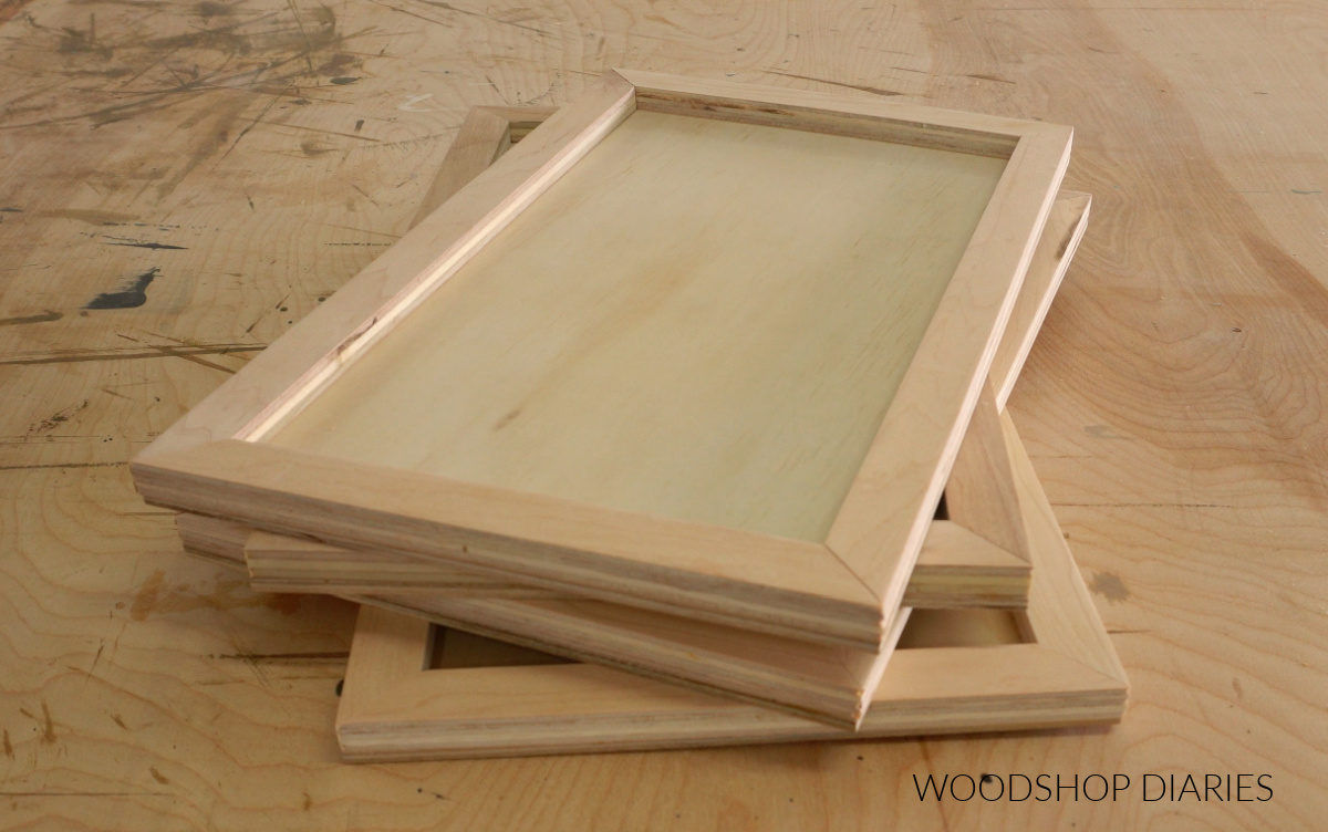 four shallow drawers made from ¼" and ½" plywood stacked on workbench