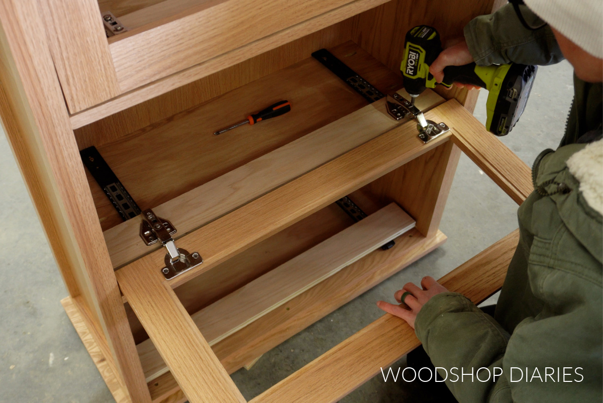 Shara Woodshop Diaries securing hinges to wood strut to install pocket doors in bookcase