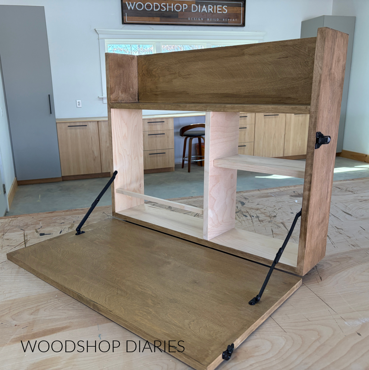 Lid supports installed on fold out Murphy desk